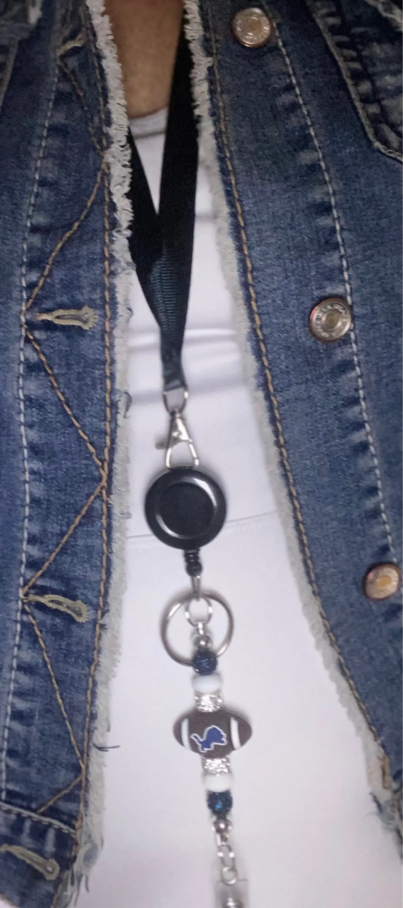 fashionable silicone beaded lanyard with decorative beads worn with denim jacket