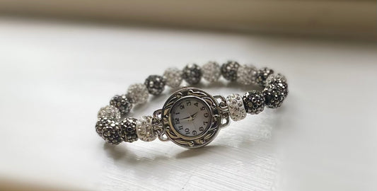 Shiny analog watch with shamballa bead bracelet set.