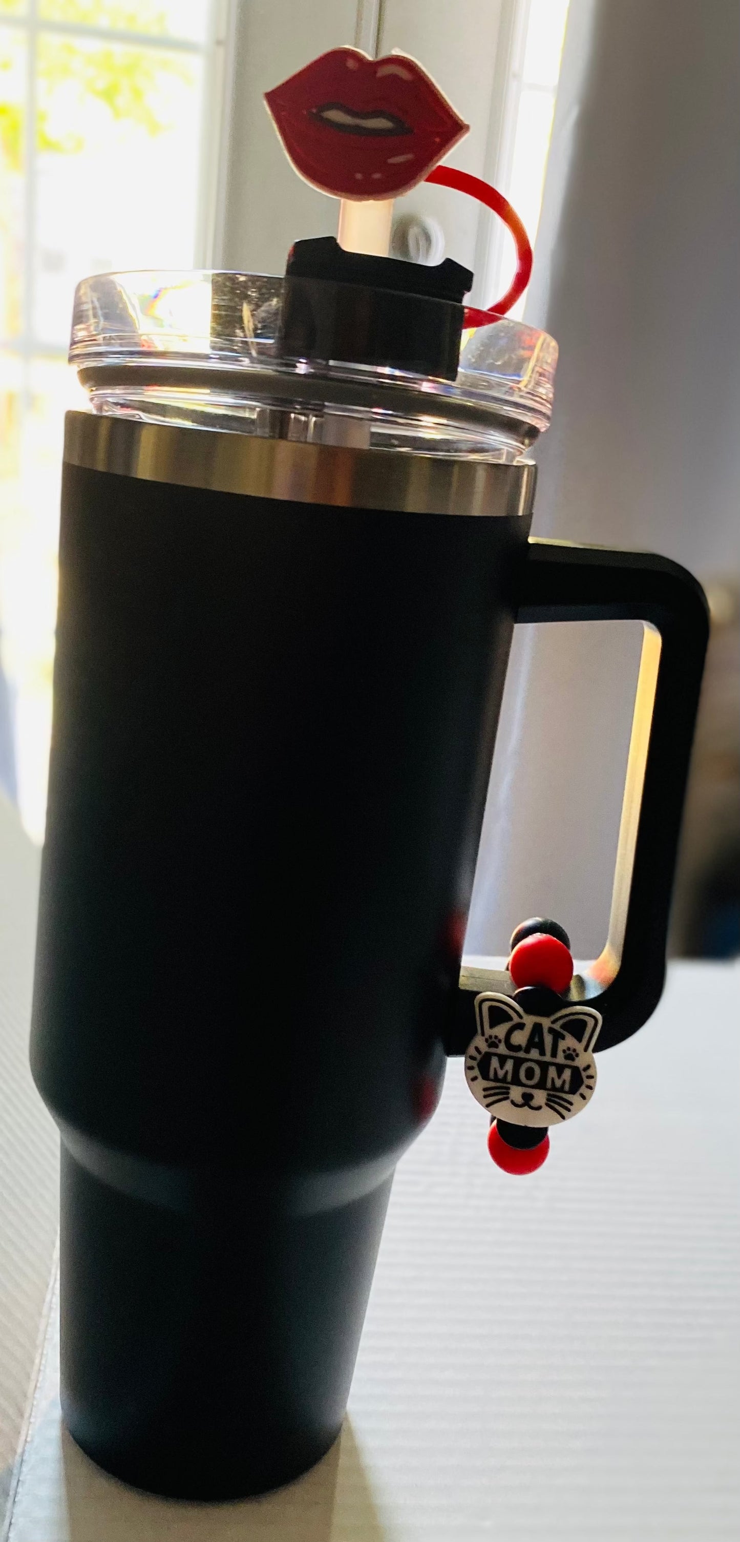 Black tumbler mug with cat mom keychain and red lips straw topper dog mom accessories