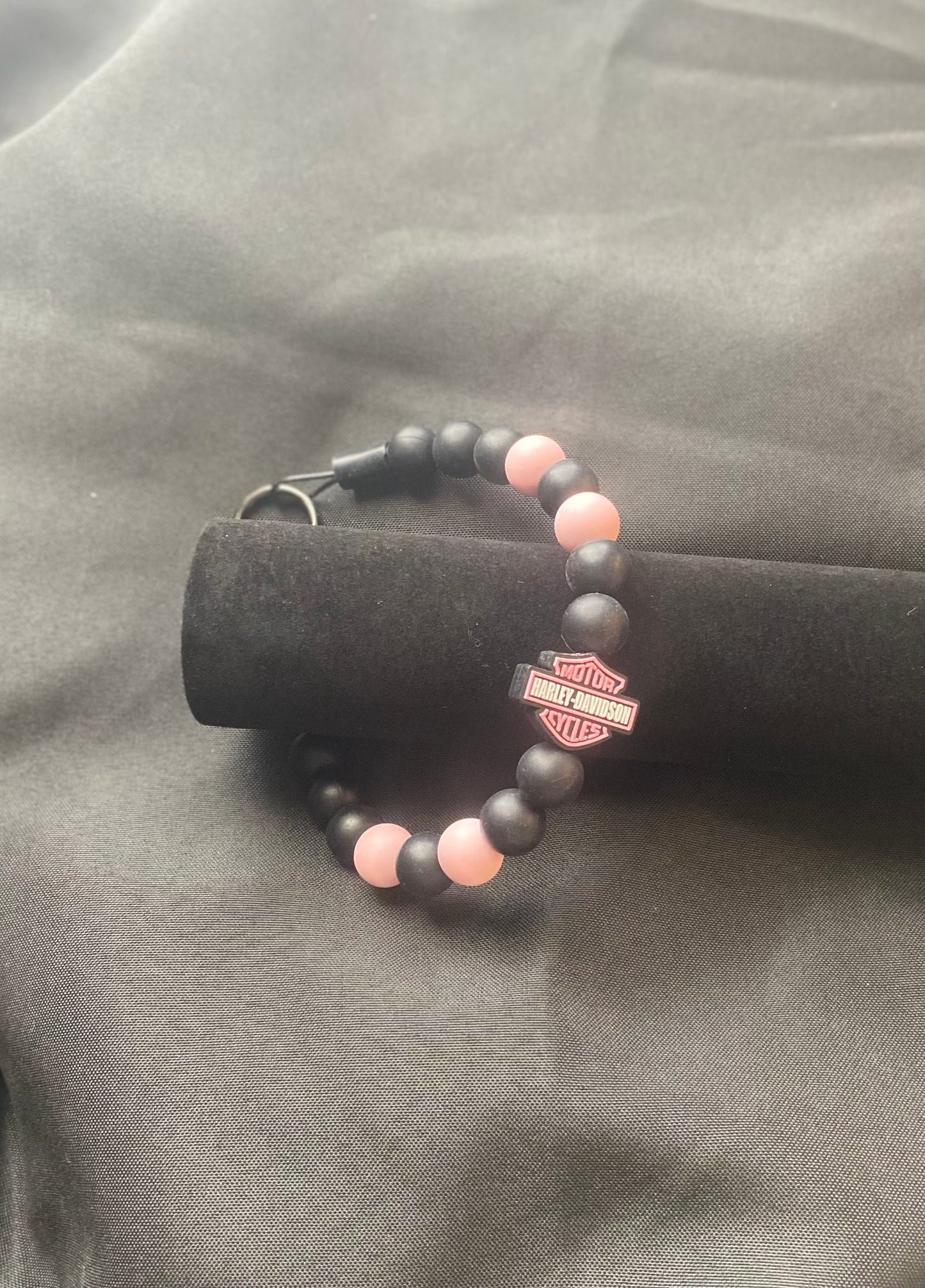 Durable stainless steel dog collar with silicone beads and metal o-ring.