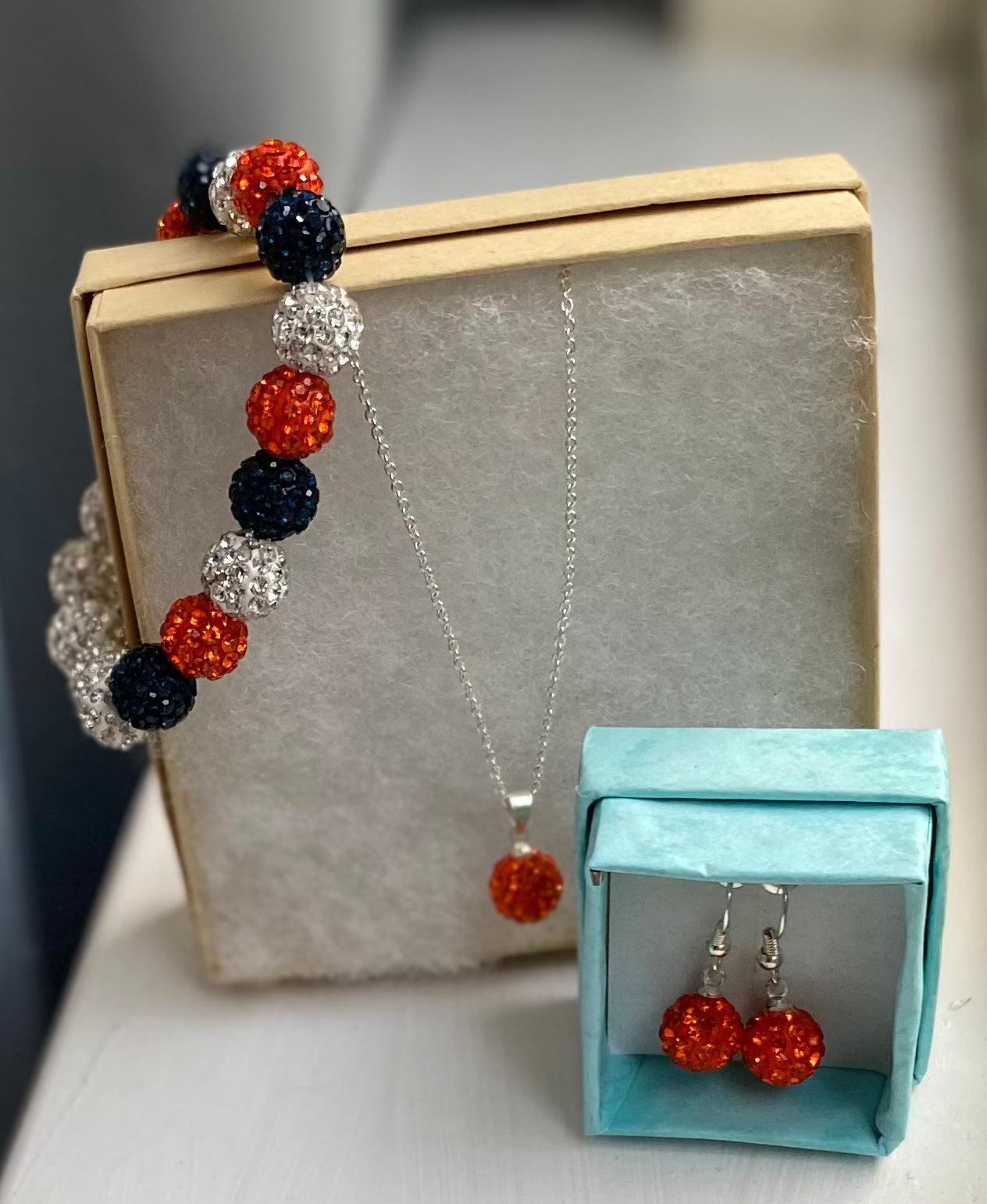 Detroit Tigers inspired necklace, earrings, and bracelet set with disco ball-like beads.